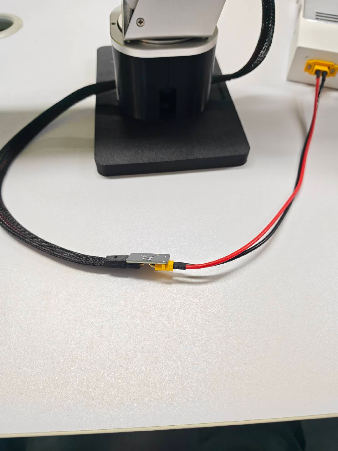 Connect the XT60 to XT30 cable to the adapter board